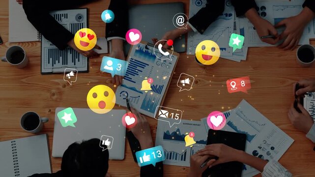 Diverse Hands Collaborating Over Data Reports with Social Media Icons Representing Engagement and Digital Interaction in Modern Business Environment Gluon.