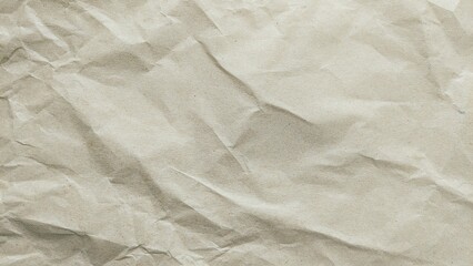 Obraz premium Crumpled cream paper texture background. Abstract recycled kraft paper surface. Vintage old paper backdrop with empty copy space.