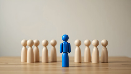 Individual leadership and unique talent concept with blue wooden figure standing out from crowd for corporate recruitment website banner