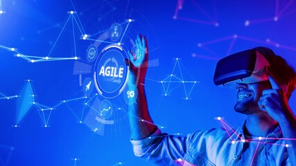 A person wearing a virtual reality headset interacts with a digital interface in a vibrant blue setting, highlighting the intersection of technology and creativity. Raster