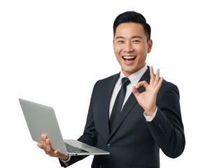 Businessman holding laptop and giving thumbs up