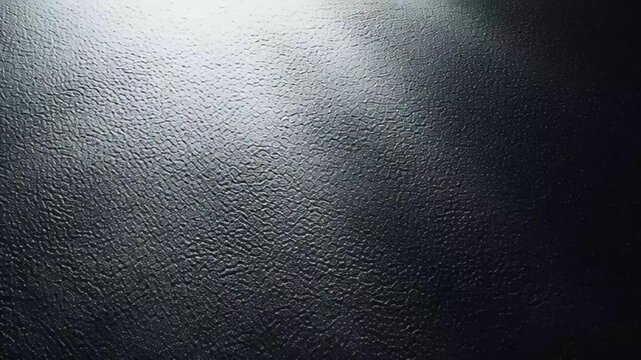 Pure black background enhanced with subtle film grain texture for authentic cinematic styling