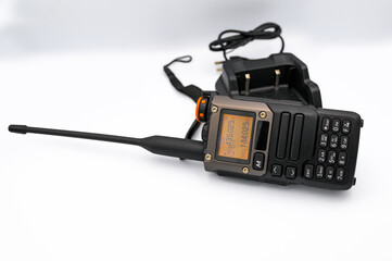 Fototapeta premium Handheld two way radio charging on white background