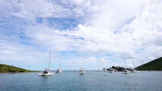 Saba, Virgin Gorda cove where sailboats and catamarans are anchored and moored in the British Virgin Islands