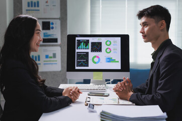 Business people discussing data analytics while planning strategy