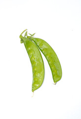 Snow peas are a type of pea with flat pods that are edible both the pods and the small seeds inside. They have a mildly sweet taste and are commonly used in stir-fries.
