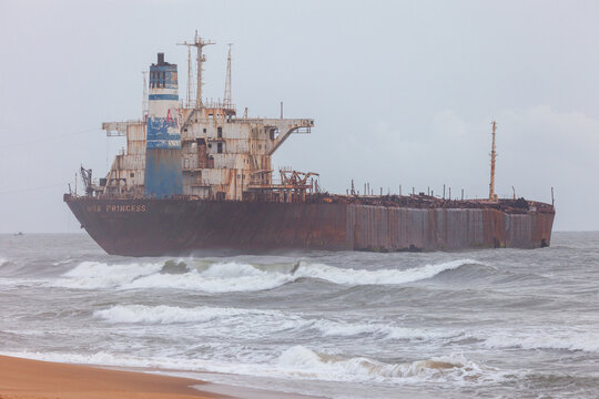 Wreck of the oil tanker River Princess stranded off Candolim beach, Goa, India. Abandoned cargo ship symbolizing marine pollution and environmental impact on the coastline.
