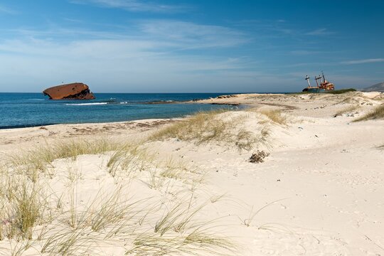 Wreck ships on Rimel beach and Mediterranean sea near Bizerte city. Tunisia. Africa.