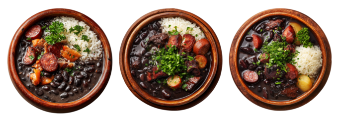 Traditional Brazilian feijoada dish with rice, black beans, beef, stew pork and oranges in bowl isolated on white background