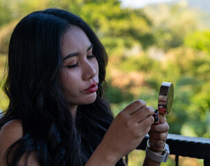 Thai Girl at Restaurant and Lake in Thailand