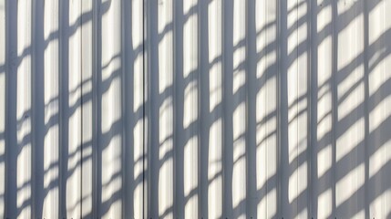 Fototapeta premium A white wall with a grid pattern.