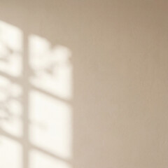 Vertical abstract background featuring soft sunlight and geometric window shadow on smooth beige plaster wall