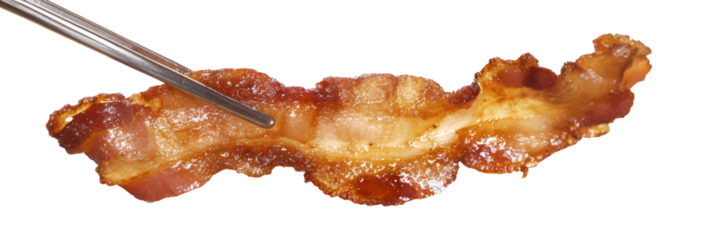 Crispy bacon strip held with metal tongs close-up
