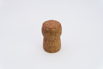 Bottle cork on a white background for wine or champagne, cork tree, alcohol and health risks, problems in the family due to alcohol, wine for relaxation. High quality
