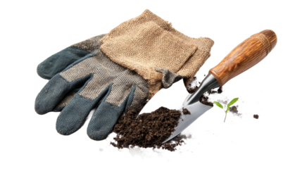 Gardening tools with gloves and soil for planting.