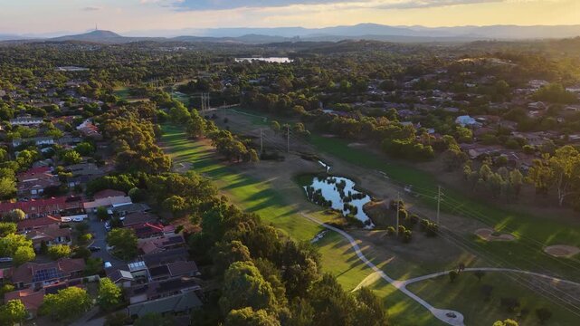 Aerial Drone View of Canberra Golf Course and Suburbs at Sunset