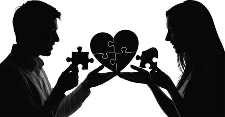 A silhouette of a couple holding puzzle pieces to form a heart