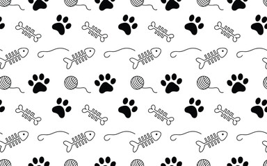 Black paw prints fish bones and yarn balls on white background