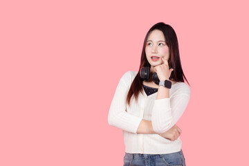Asian woman, Thai cute model teen girl standing isolated with Thinking guess thoughtful expression