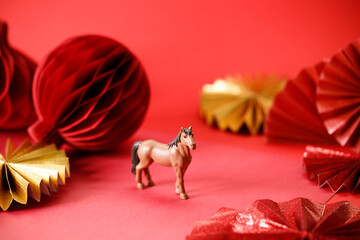 A festive Chinese New Year background with red paper fans.