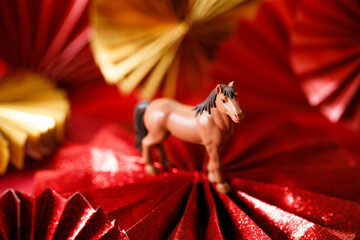 A festive Chinese New Year background with red paper fans.