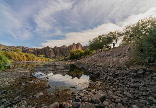 Watershed reflecting mountainous rugged landscape