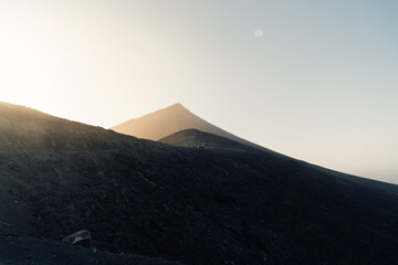 Silhouetted mountain at sunset above Cofete beach, Fuerteventura
