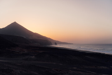 Volcanic coastline at sunset in Cofete, Fuerteventura, Canary Islands