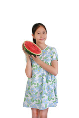 A lovely Asian girl in a floral dress smiling warmly while holding a fresh half of a juicy watermelon against white background.