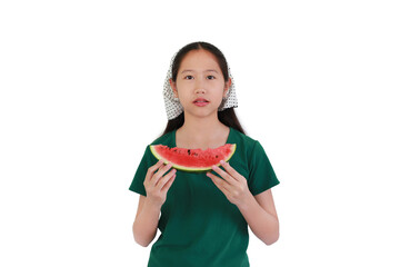 Cute Asian girl wearing green t-shirt and polka-dot headscarf, holding a fresh slice of watermelon against white background.
