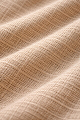 Natural beige linen fabric texture background with soft folds, macro close up of rough woven cloth material surface, neutral organic textile pattern and blank canvas detail for fashion design concept