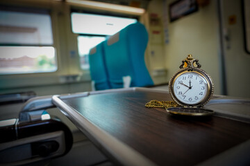Vintage Pocket Watch on a Train Table Interior