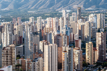 Benidorm Spain skyline city architecture building cluster with mountain backdrop presenting urban travel view and tourism destination