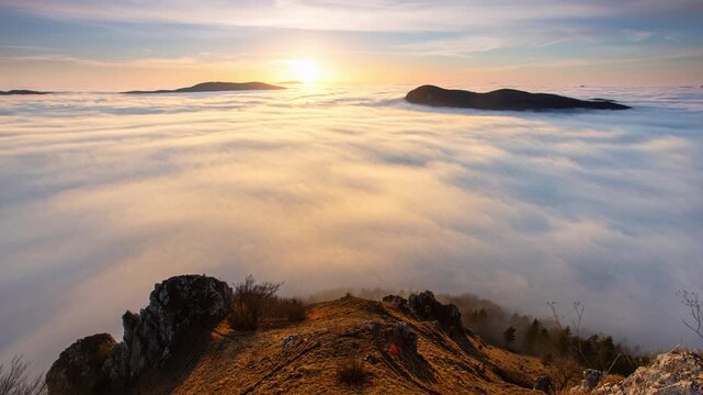 Time lapse from day to night Above clouds - mountain landscape at sunset, Slovakia