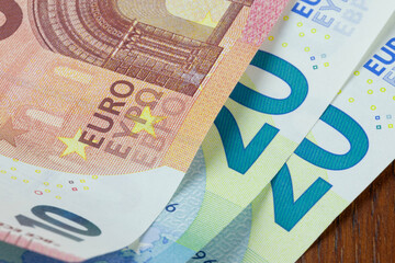 Fifty Euros close-up in ten and twenty denominations with Latin, Greek and Bulgarian alphabet