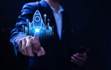 Businessman touching transparent rocket icon launching. Startup concept, rocket, company growth, digital success, technology, marketing, finance, innovation. Creative design project.