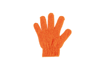 An orange exfoliating glove in a hand against a transparent background.