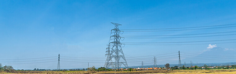 High Voltage Power Lines in Rural Landscape