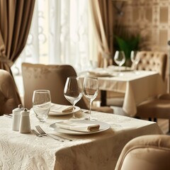 Elegant table setting with a banquet table decorated with floral arrangements in beige tones.