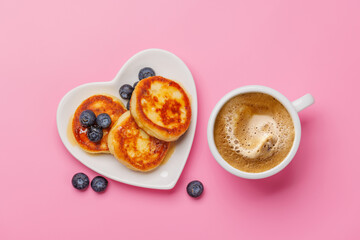 Homemade pancakes with blueberries and syrup