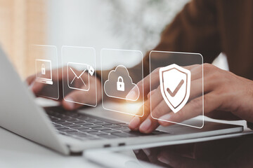Global Data Security and Cyber Protection Concept , Man Working on Laptop with Digital Safety for data security, email encryption, cloud protection .