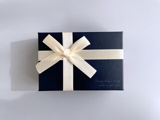 Elegant gift box and light blue background