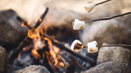 Friends gather around a glowing campfire, roasting marshmallows on sticks while sharing stories Generative AI