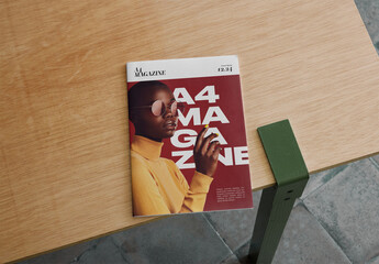 Mockup Of A4 Magazine With Customized Cover On Table