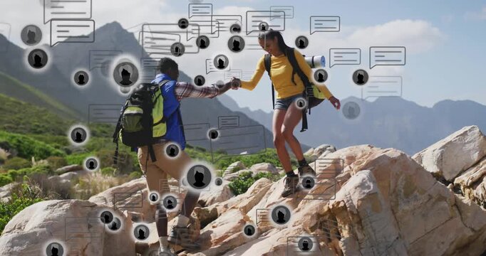 Pair man reaching, woman grasping stepping, man pulling, tech icons msgs obscuring helping navigate