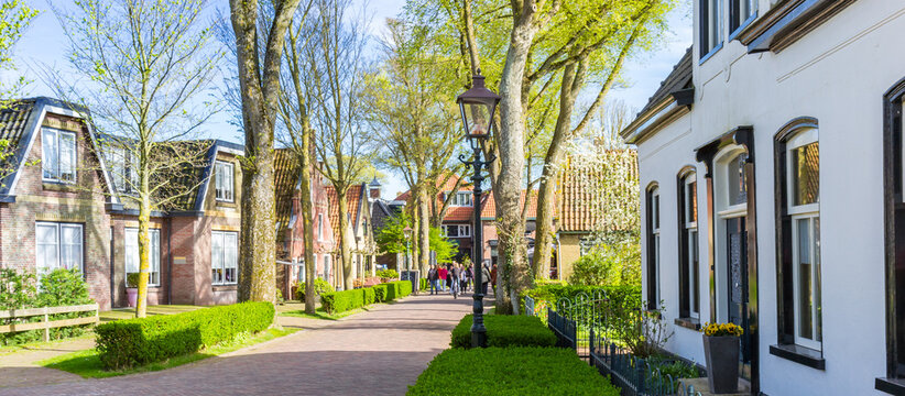 Panorama of historic houses in the center of Nes, Ameland, Netherlands
