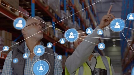 Animation of network of connections over two diverse warehouse workers - Powered by Adobe