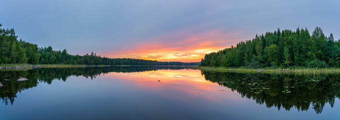 Hallangen lake panorama at sunset. Kalmar region in Sweden. Europe