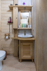 Rustic wooden bathroom vanity with vessel sink and mirror