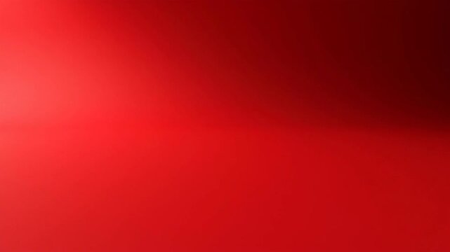 Abstract red background with gradient effect and illuminated surface